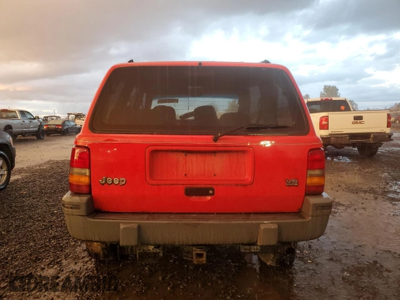 1995 Jeep Grand Cherokee Laredo with VIN 1J4GZ58Y5SC536885, listed as a Copart auction lot 75331944 with 144,319 mi miles and Salvage Title. Bid and sale history available at carsss.com. Image 6.