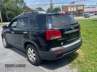 2013 Kia Sorento LX with VIN 5XYKTCA65DG324775, listed as a Copart auction lot 63433705 with 128,031 mi miles and Clean title. Bid and sale history available at DreamBid. Image 3.