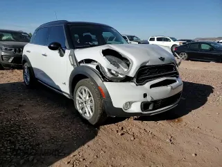 2015 MINI Countryman S with VIN WMWZC5C53FWP44388, listed as a Copart auction lot 54560585 with 67,913 mi miles and Salvage Title. Bid and sale history available at DreamBid. Image 13.