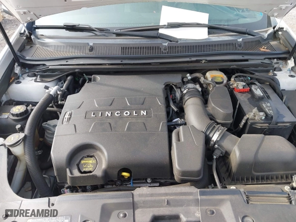 2013 Lincoln MKS with VIN 1LNHL9DK4DG611684, listed as a IAAI auction lot 42043879 with 132,866 mi miles. Bid and sale history available at carsss.com. Image 10.