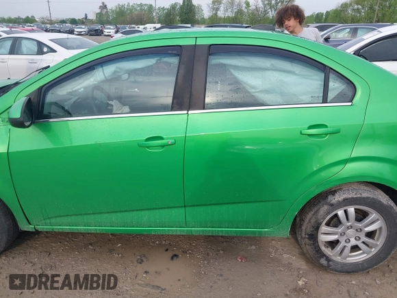2015 Chevrolet Sonic LT with VIN 1G1JC5SB8F4168860, listed as a IAAI auction lot 42163278 with 102,855 mi miles and . Bid and sale history available at DreamBid. Image 14.