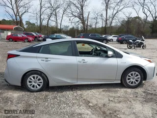 2021 Toyota Prius L Eco with VIN JTDKAMFU1M3152848, listed as a IAAI auction lot 41600212 with 140,114 mi miles. Bid and sale history available at carsss.com. Image 12.