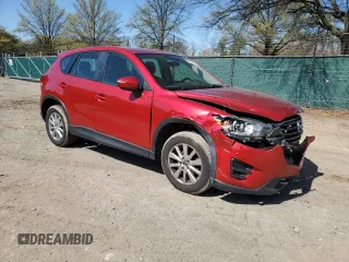 2016 Mazda CX-5 Sport with VIN JM3KE4BY8G0635800, listed as a Copart auction lot 51293125 with 82,064 mi miles and Salvage Title. Bid and sale history available at carsss.com. Image 4.
