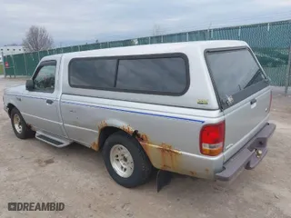 1997 Ford Ranger XL with VIN 1FTCR10U8VPA00709, listed as a IAAI auction lot 42071941 with 153,501 mi miles. Bid and sale history available at carsss.com. Image 3.