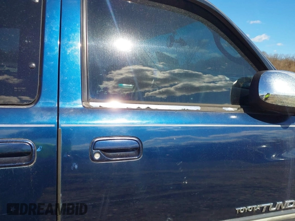 2003 Toyota Tundra SR5 with VIN 5TBBT44143S388838, listed as a IAAI auction lot 41498748 with 180,937 mi miles and . Bid and sale history available at carsss.com. Image 14.