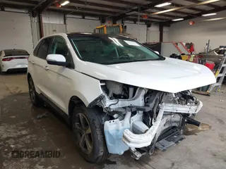 2020 Ford Edge SEL z VIN 2FMPK4J98LBA94897, wystawiony jako IAAI lot #41625331 z przebiegiem 75 732 mil mil oraz . Historia ofert i sprzedaży dostępna na DreamBid. Obrazek 1.