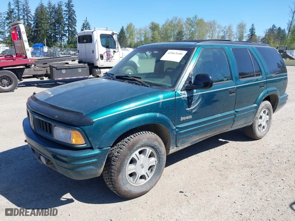 1997 Oldsmobile Bravada with VIN 1GHDT13W8V2713474, listed as a IAAI auction lot 42062680 with 187,046 mi miles. Bid and sale history available at carsss.com. Image 6.
