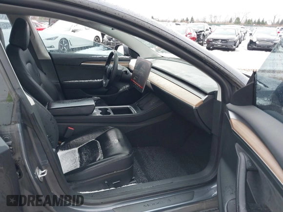2023 Tesla Model 3 Performance with VIN 5YJ3E1EC6PF590739, listed as a IAAI auction lot 40919165 with 20,474 mi miles. Bid and sale history available at carsss.com. Image 5.