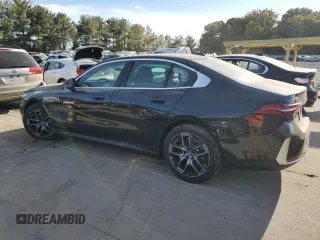 2024 BMW i5 eDrive40 with VIN WBY33FK06RCR89436, listed as a Copart auction lot 76718924 with 0 mi miles and Salvage Title. Bid and sale history available at carsss.com. Image 2.