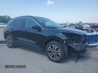 2020 Ford Escape SEL with VIN 1FMCU9H66LUB77448, listed as a Copart auction lot 61697275 with 70,997 mi miles and Salvage title. Bid and sale history available at DreamBid. Image 4.