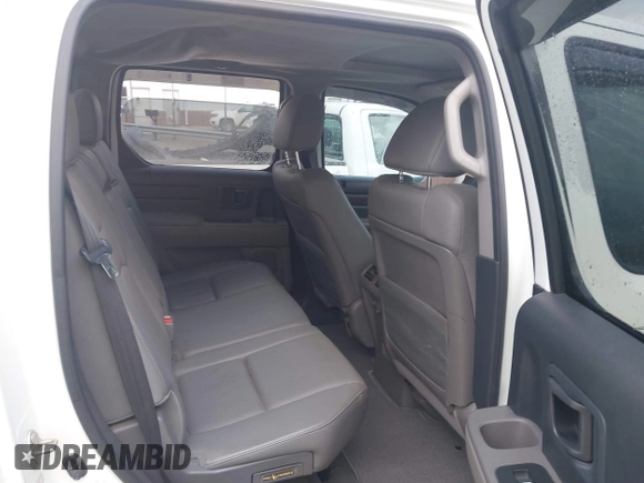 2014 Honda Ridgeline RTL with VIN 5FPYK1F58EB011186, listed as a IAAI auction lot 41903178 with 113,364 mi miles. Bid and sale history available at carsss.com. Image 8.