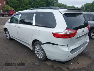 2015 Toyota Sienna Limited with VIN 5TDDK3DCXFS103594, listed as a IAAI auction lot 42515466 with 96,684 mi miles and . Bid and sale history available at DreamBid. Image 3.