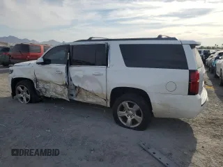 2015 Chevrolet Suburban LT with VIN 1GNSKJKC4FR691285, listed as a Copart auction lot 53137615 with 225,415 mi miles and Salvage Title. Bid and sale history available at DreamBid. Image 2.