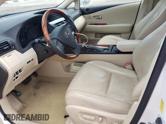 2010 Lexus RX 450h with VIN JTJBC1BA9A2022402, listed as a Copart auction lot 52674284 with 221,661 mi miles and Salvage Title. Bid and sale history available at DreamBid. Image 7.