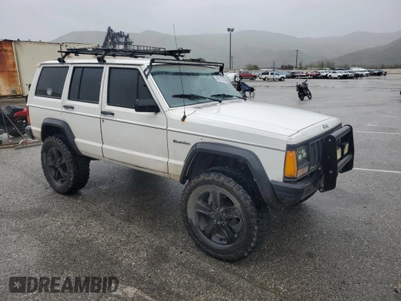 1989 Jeep Cherokee z VIN 1J4FT28LXKL601505, wystawiony jako Copart lot #49312265 z przebiegiem 264 769 mil mil oraz Szkoda całkowita • Salvage title. Historia ofert i sprzedaży dostępna na DreamBid. Obrazek 4.