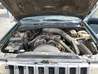 1993 Jeep Grand Cherokee Laredo with VIN 1J4GZ58Y8PC513026, listed as a Copart auction lot 57001465 with 135,242 mi miles and Clean title. Bid and sale history available at DreamBid. Image 12.