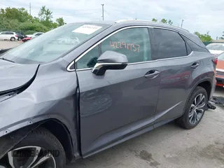 2018 Lexus RX 350 z VIN 2T2BZMCA0JC138411, wystawiony jako IAAI lot #42291737 z przebiegiem 58 725 mil mil oraz . Historia ofert i sprzedaży dostępna na DreamBid. Obrazek 15.