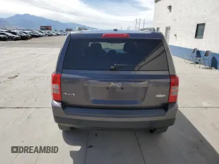 2014 Jeep Patriot Latitude with VIN 1C4NJRFB1ED727017, listed as a Copart auction lot 61660885 with 151,097 mi miles and Salvage title. Bid and sale history available at DreamBid. Image 6.