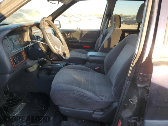 1997 Jeep Grand Cherokee Laredo with VIN 1J4GZ58S7VC685900, listed as a Copart auction lot 82105214 with 151,036 mi miles and Salvage Title. Bid and sale history available at carsss.com. Image 7.