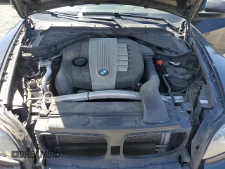 2012 BMW X5 35d z VIN 5UXZW0C59CL670242, wystawiony jako Copart lot #57638165 z przebiegiem 174 430 mil mil oraz Szkoda całkowita • Salvage title. Historia ofert i sprzedaży dostępna na DreamBid. Obrazek 12.