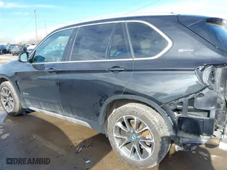 2018 BMW X5 xDrive40e iPerformance with VIN 5UXKT0C52J0W02406, listed as a IAAI auction lot 41449943 with 74,215 mi miles. Bid and sale history available at carsss.com. Image 15.