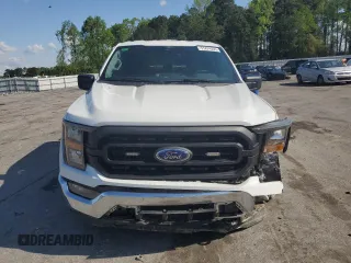 2023 Ford F-150 XL with VIN 1FTFW1ED8PFD25707, listed as a Copart auction lot 51474555 with 16,073 mi miles and Salvage title. Bid and sale history available at DreamBid. Image 5.