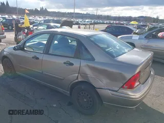 2004 Ford Focus SE with VIN 1FAFP34354W167961, listed as a IAAI auction lot 41545304 with 128,560 mi miles and . Bid and sale history available at DreamBid. Image 6.