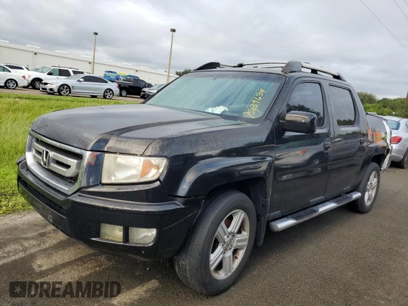 2010 Honda Ridgeline RTL with VIN 5FPYK1F5XAB010390, listed as a Copart auction lot 75039634 with 0 mi miles and Salvage Title. Bid and sale history available at carsss.com. Image 1.