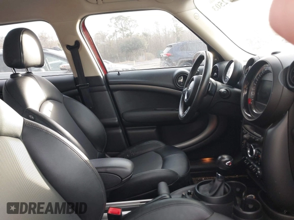 2015 MINI Countryman S with VIN WMWZC3C50FWT05122, listed as a IAAI auction lot 41572503 with 120,885 mi miles and . Bid and sale history available at DreamBid. Image 5.