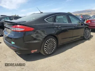 2017 Ford Fusion Titanium with VIN 3FA6P0SU5HR277220, listed as a Copart auction lot 63799685 with 123,837 mi miles and Salvage title. Bid and sale history available at DreamBid. Image 3.