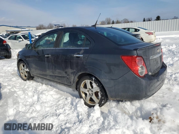2013 Chevrolet Sonic LTZ z VIN 1G1JE5SH6D4114209, wystawiony jako Copart lot #44854675 z przebiegiem 130 385 mil mil oraz Czysty tytuł • Clean title. Historia ofert i sprzedaży dostępna na DreamBid. Obrazek 2.