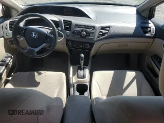 2012 Honda Civic LX z VIN 2HGFB2F5XCH517276, wystawiony jako Copart lot #59443775 z przebiegiem 98 749 mil mil oraz Szkoda całkowita • Salvage title. Historia ofert i sprzedaży dostępna na DreamBid. Obrazek 8.