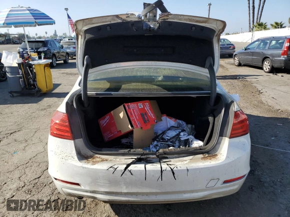 2013 BMW 3 Series 320i with VIN WBA3B1C50DK128766, listed as a Copart auction lot 86587114 with 0 mi miles and Salvage Title. Bid and sale history available at carsss.com. Image 6.