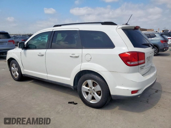 2012 Dodge Journey SXT z VIN 3C4PDCBG9CT213423, wystawiony jako Copart lot #65246735 z przebiegiem 319 806 mil mil oraz Szkoda całkowita • Salvage title. Historia ofert i sprzedaży dostępna na DreamBid. Obrazek 2.