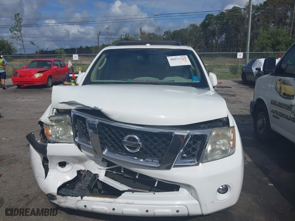 2012 Nissan Pathfinder SV with VIN 5N1AR1NN1CC616194, listed as a IAAI auction lot 40821219 with 104,698 mi miles. Bid and sale history available at carsss.com. Image 12.