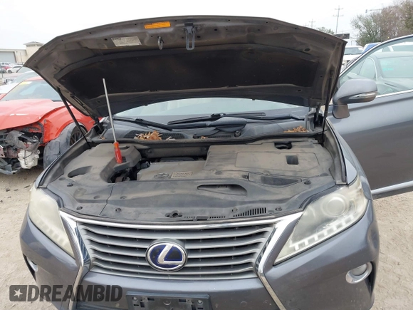 2013 Lexus RX 450h with VIN JTJBC1BA0D2440528, listed as a IAAI auction lot 41591177 with 156,869 mi miles and . Bid and sale history available at DreamBid. Image 10.