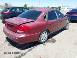 2006 Ford Taurus SE z VIN 1FAFP53U76A242715, wystawiony jako IAAI lot #42283883 z przebiegiem 128 763 mil mil oraz . Historia ofert i sprzedaży dostępna na DreamBid. Obrazek 4.