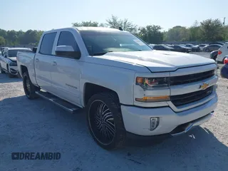 2017 Chevrolet Silverado 1500 LT with VIN 3GCUKREC4HG364108, listed as a IAAI auction lot 42050014 with 148,691 mi miles and . Bid and sale history available at DreamBid. Image 1.