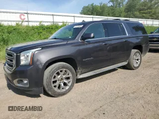 2015 GMC Yukon XL SLT with VIN 1GKS2HKCXFR305300, listed as a Copart auction lot 57120804 with 155,910 mi miles and Clean Title. Bid and sale history available at carsss.com. Image 1.