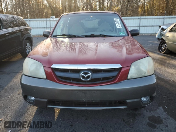 2001 Mazda Tribute LX with VIN 4F2CU08111KM19933, listed as a Copart auction lot 81174614 with 209,736 mi miles and Salvage Title. Bid and sale history available at DreamBid. Image 5.