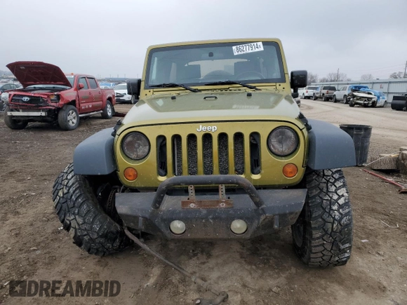 2007 Jeep Wrangler Unlimited Rubicon с VIN 1J4GA691X7L145737, выставлен на аукционе Copart как лот 86277914 с пробегом 285 624 миль миль и Списание • Salvage title. История ставок и продаж доступна на DreamBid. Изображение 5.