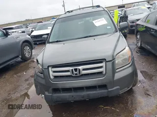 2007 Honda Pilot EX-L with VIN 5FNYF18697B002843, listed as a IAAI auction lot 41549328 with 202,365 mi miles and . Bid and sale history available at DreamBid. Image 12.