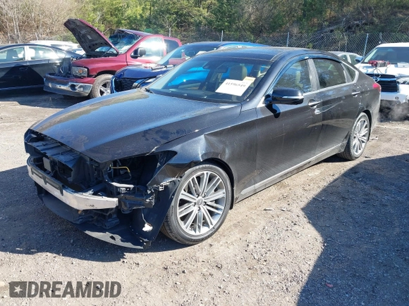 2018 Genesis G80 3.8L with VIN KMHGN4JE0JU265072, listed as a IAAI auction lot 41596549 with 121,502 mi miles. Bid and sale history available at carsss.com. Image 2.