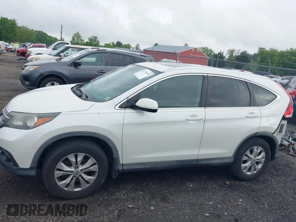 2014 Honda CR-V EX-L with VIN 5J6RM4H74EL014066, listed as a IAAI auction lot 42176490 with 206,016 mi miles and . Bid and sale history available at DreamBid. Image 15.