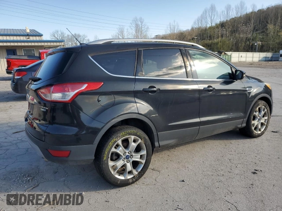 2014 Ford Escape Titanium with VIN 1FMCU9J94EUE57909, listed as a Copart auction lot 51955785 with 154,819 mi miles and Salvage Title. Bid and sale history available at DreamBid. Image 3.