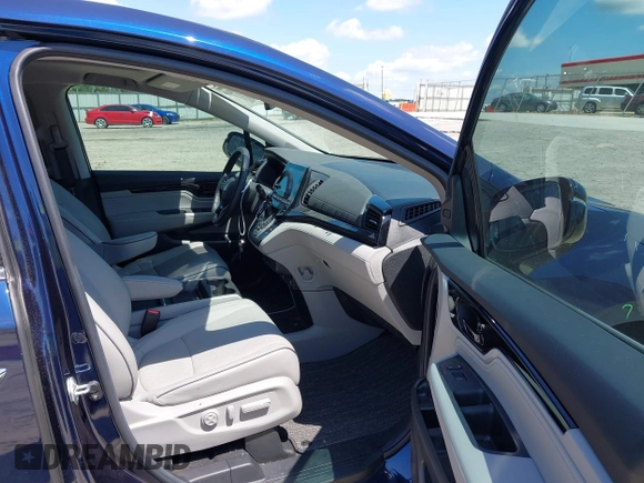 2024 Honda Odyssey Elite z VIN 5FNRL6H97RB057976, wystawiony jako IAAI lot #42428910 z przebiegiem 13 021 mil mil oraz . Historia ofert i sprzedaży dostępna na DreamBid. Obrazek 5.