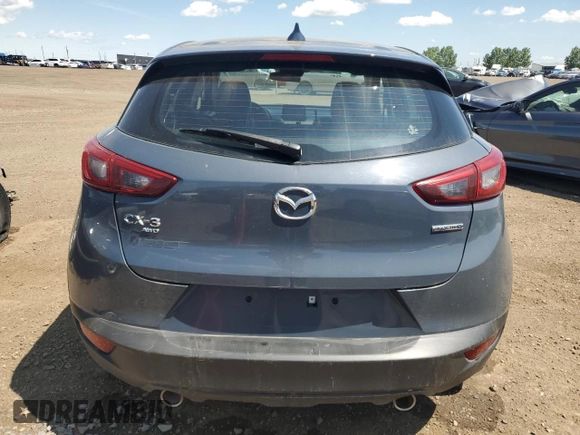 2021 Mazda CX-3 Touring z VIN JM1DKFC78M1508479, wystawiony jako Copart lot #61866195 z przebiegiem 73 746 mil mil oraz Szkoda całkowita • Salvage title. Historia ofert i sprzedaży dostępna na DreamBid. Obrazek 6.