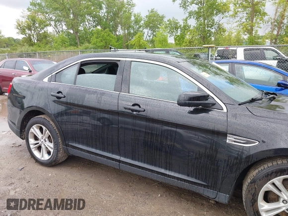 2015 Ford Taurus SEL z VIN 1FAHP2E86FG172631, wystawiony jako IAAI lot #42307630 z przebiegiem 95 184 mil mil oraz . Historia ofert i sprzedaży dostępna na DreamBid. Obrazek 14.