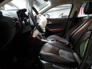 2018 Mazda CX-3 Touring z VIN JM1DKFC75J0301307, wystawiony jako Copart lot #56302175 z przebiegiem 107 676 mil mil oraz Szkoda całkowita • Salvage title. Historia ofert i sprzedaży dostępna na DreamBid. Obrazek 7.
