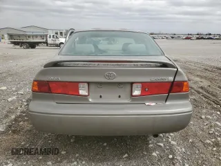 2000 Toyota Camry CE with VIN JT2BG22K6Y0471945, listed as a Copart auction lot 48932715 with Not Provided miles and Salvage Title. Bid and sale history available at DreamBid. Image 6.